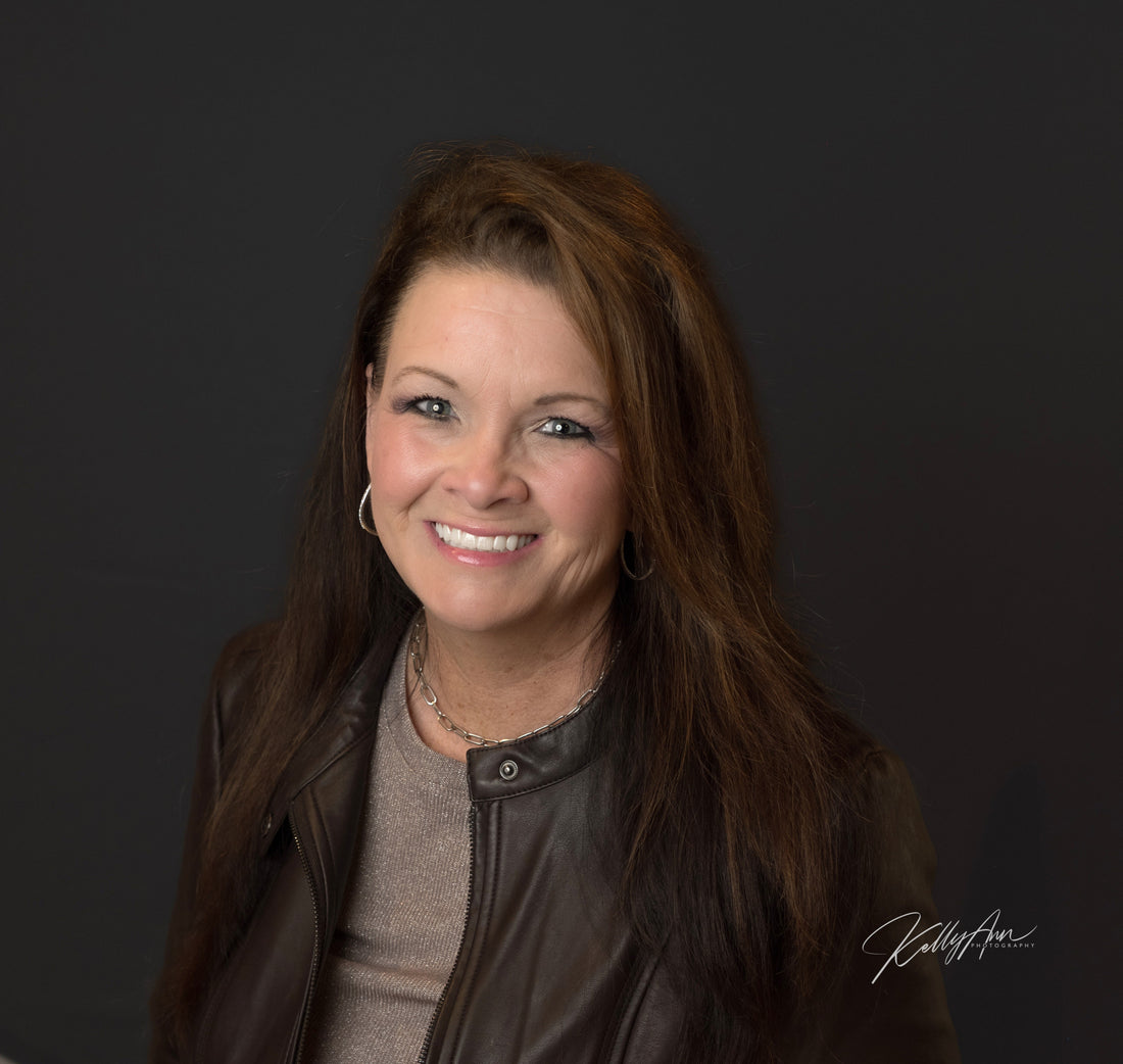 Portrait of Tress Remington, founder of 7 Semicolon Couture