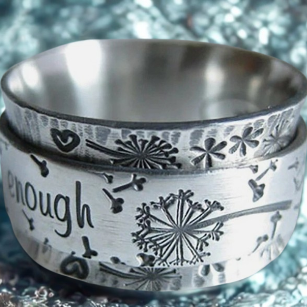 I Am Enough silver ring with intricate dandelion designs and a polished finish