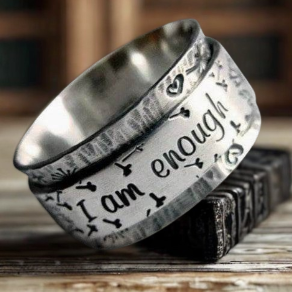 I Am Enough silver ring featuring an engraved design and a polished finish, symbolizing self-empowerment